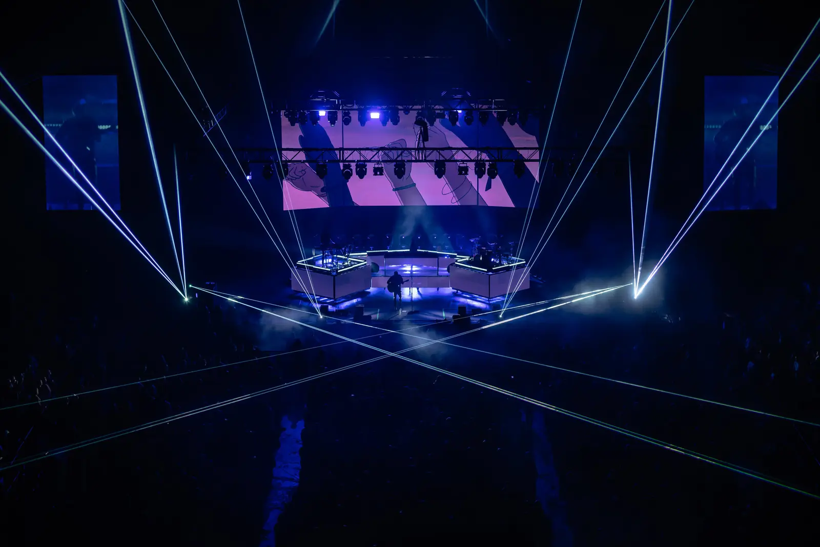 Laser and LED show over an arena stage